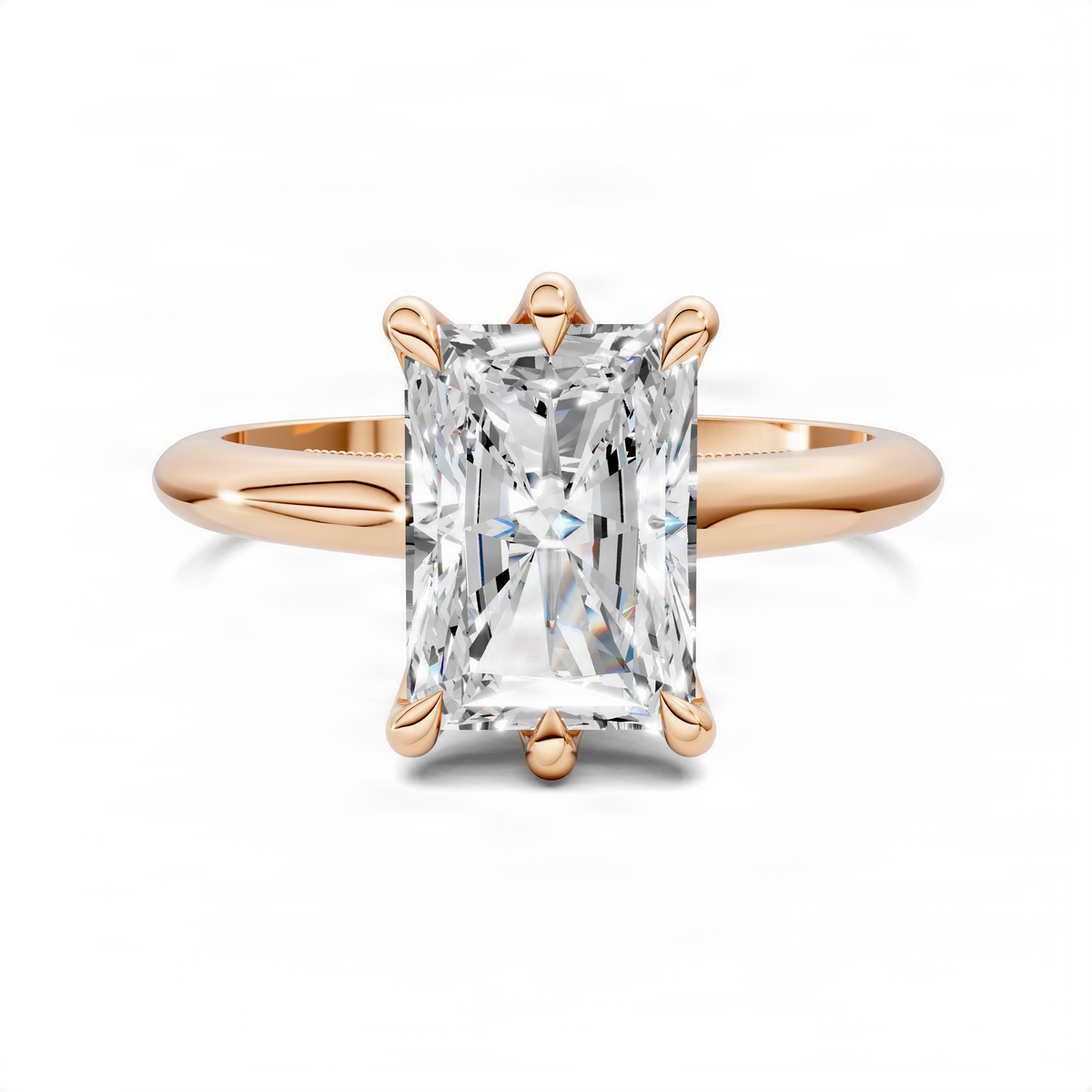 Square-cut center gemstone ring with four petal-style prongs, rose gold band